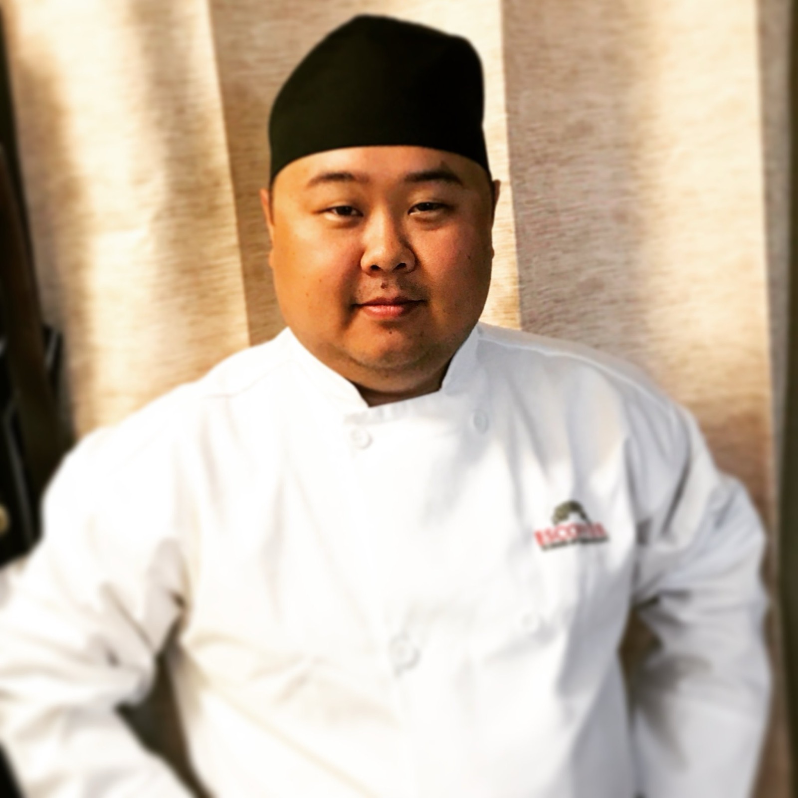 Josh Wark in a chef's coat
